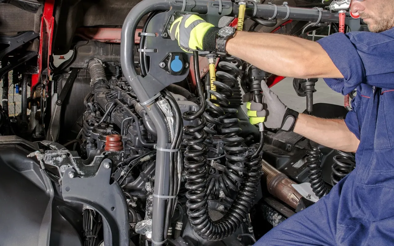 Close view of air lines and fittings on a truck chassis