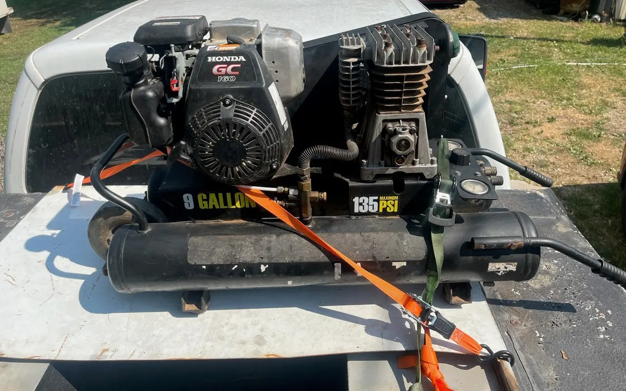 Portable air compressor and power unit used for mobile service calls