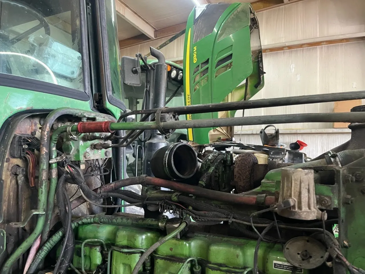 John Deere diesel engine undergoing diagnostic work