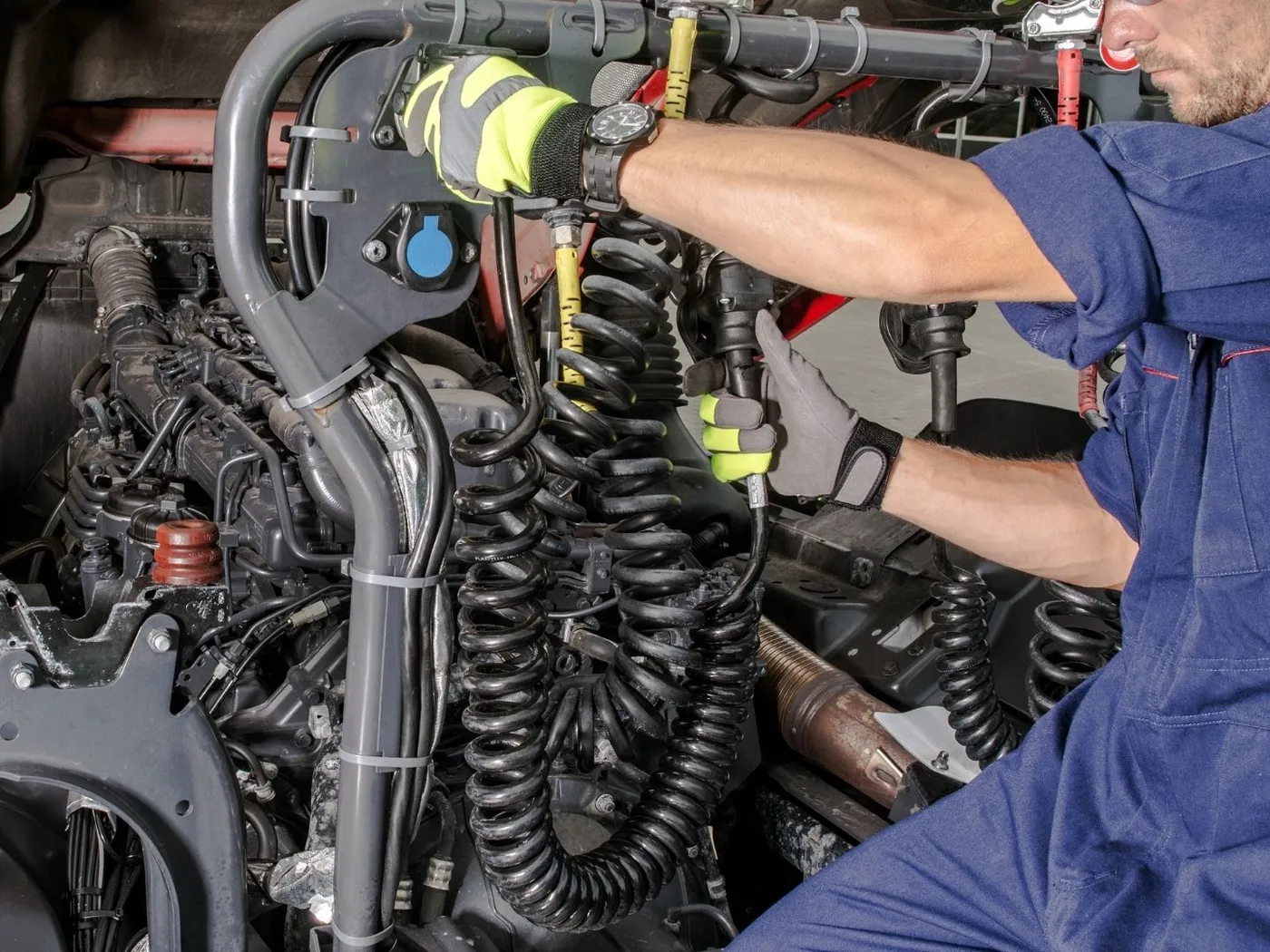 Close view of engine bay wiring and air lines